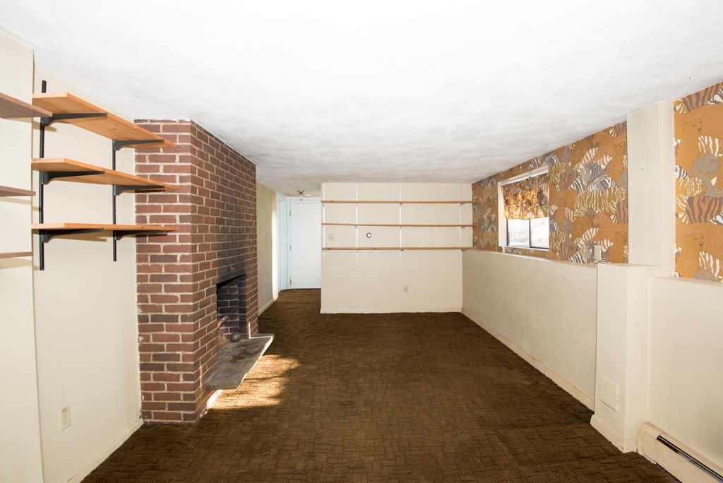 9 Fatima Road Stoneham, MA 02180 - Photo 24 of 26 a view of empty room with windows