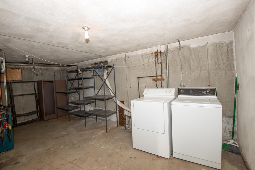 9 Fatima Road Stoneham, MA 02180 - Photo 25 of 26 a view of storage and utility room with washer and dryer