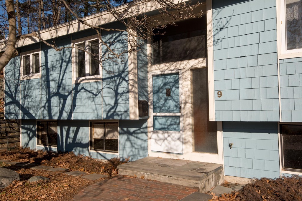 9 Fatima Road Stoneham, MA 02180 - Photo 3 of 26 a front view of a building with street
