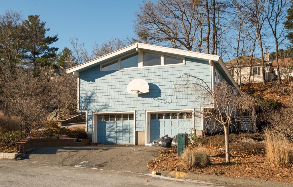 9 Fatima Road Stoneham, MA 02180 - Photo 4 of 26 a front view of a house with garden