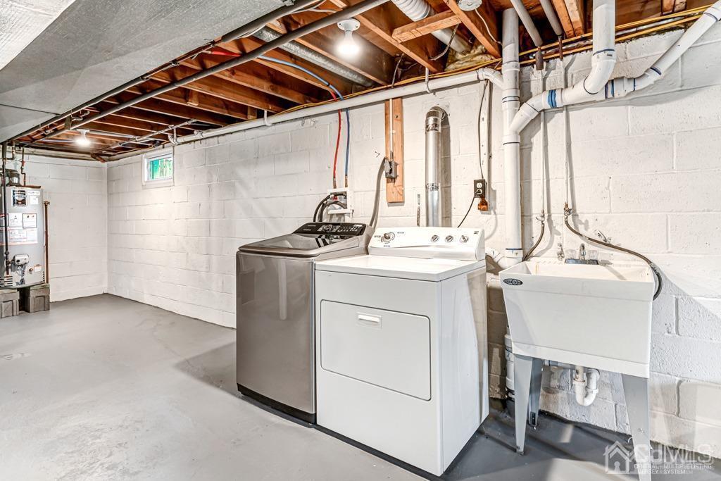 187 1st Street Middlesex, NJ 08846 - Photo 18 of 23 a utility room with dryer and washer