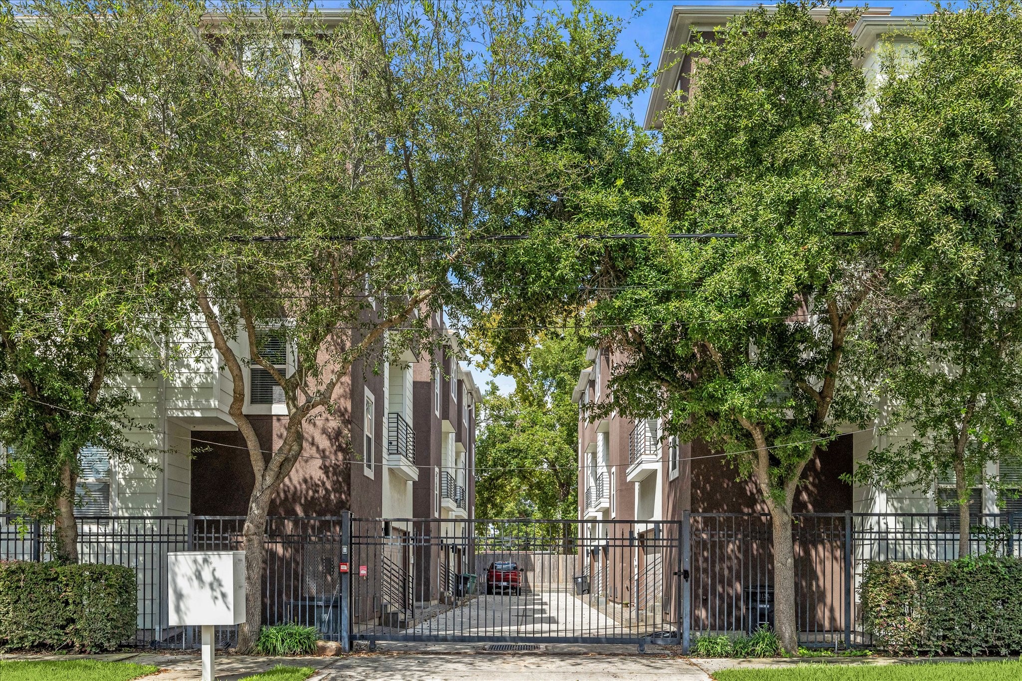 front view of a house with a tree