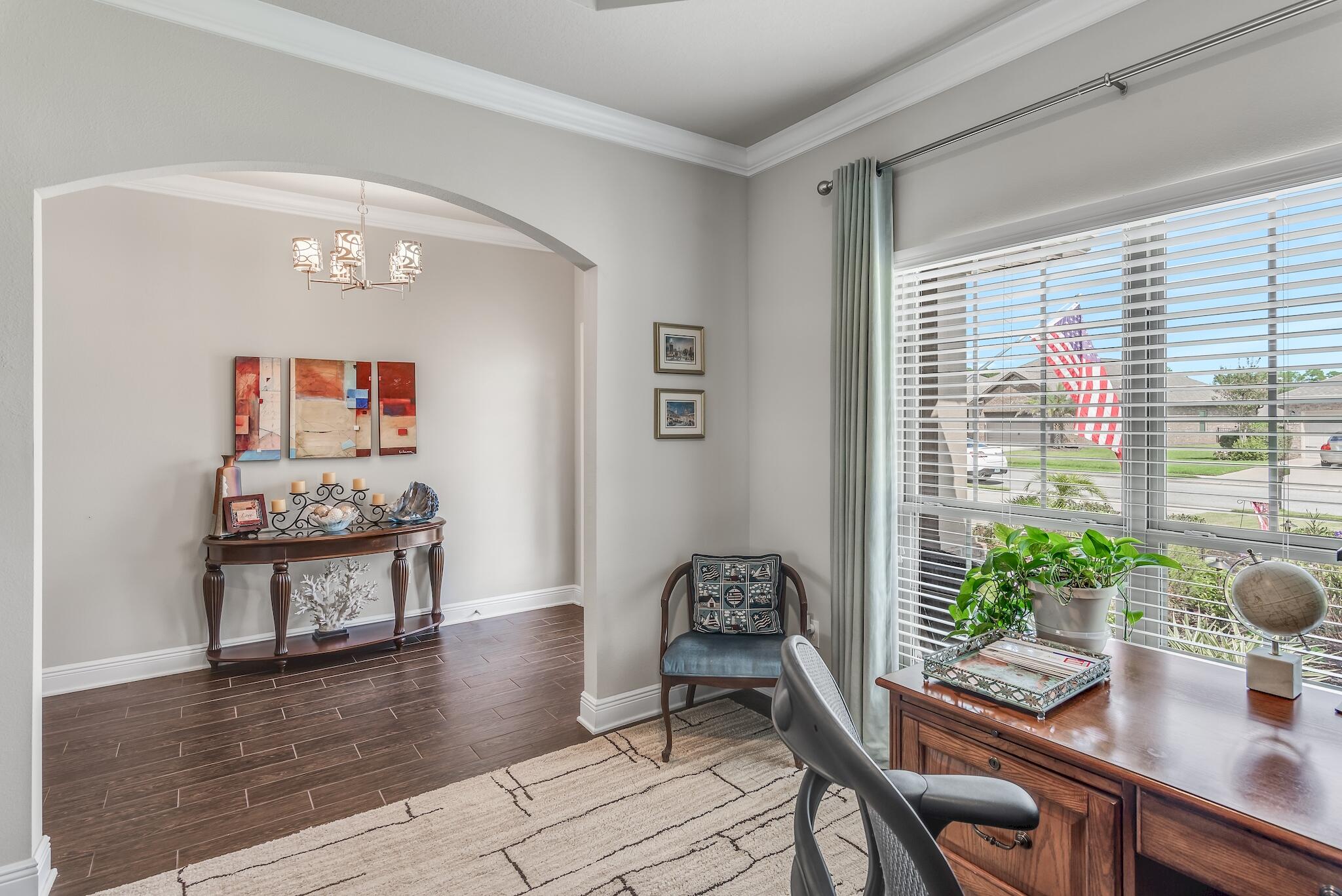 446 Pin Oak Loop Santa Rosa Beach, FL 32459 - Photo 22 of 48 a dining room with furniture and wooden floor