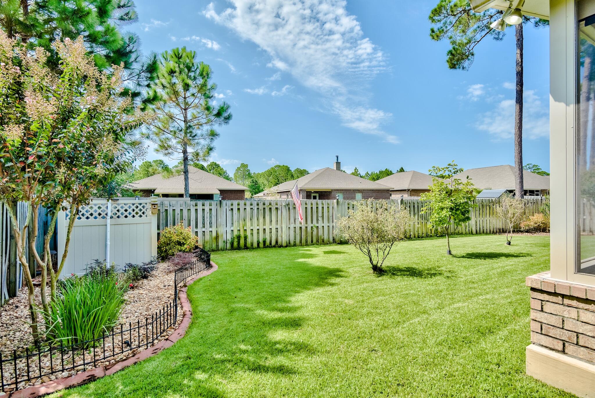 446 Pin Oak Loop Santa Rosa Beach, FL 32459 - Photo 36 of 48 a view of a garden