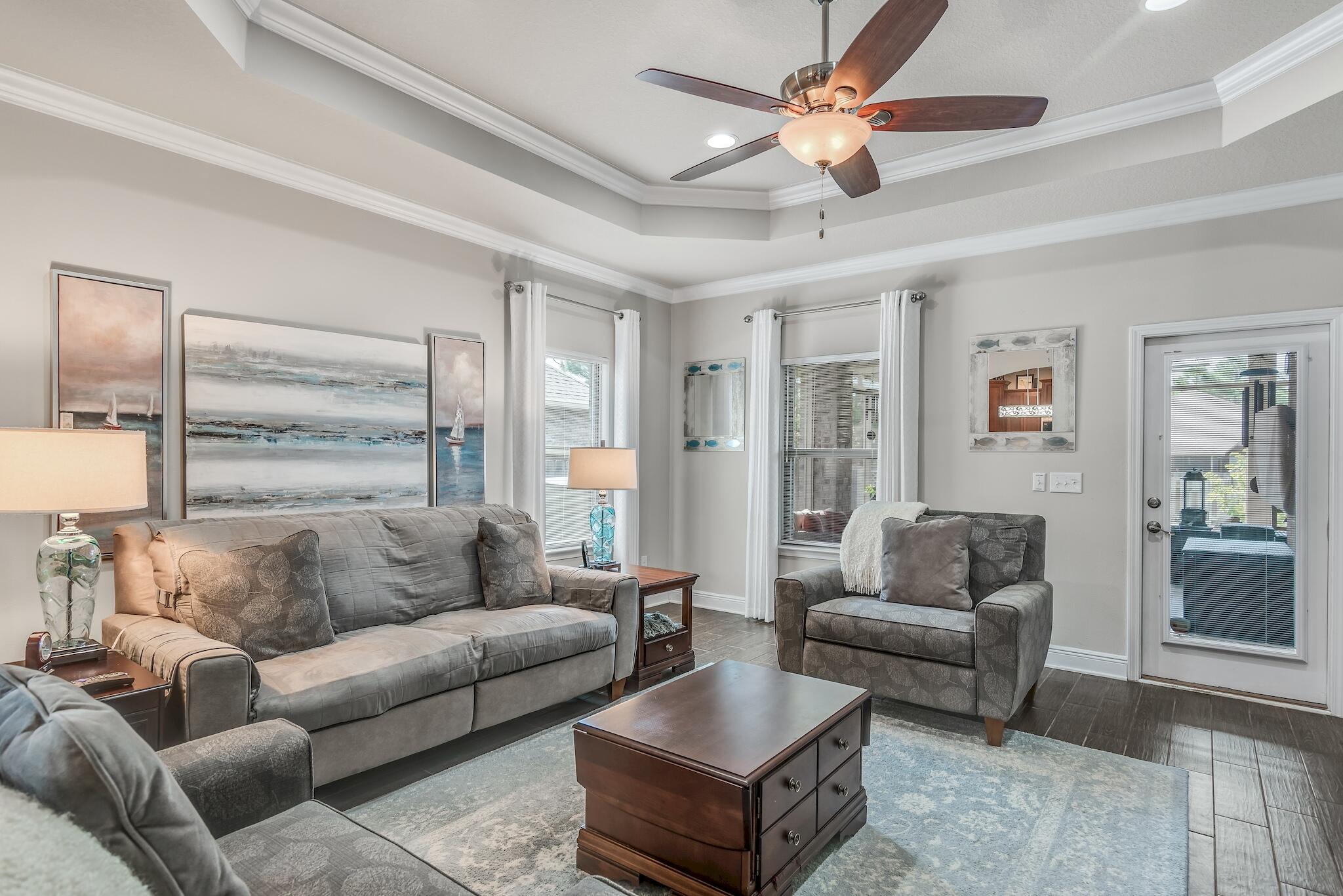 446 Pin Oak Loop Santa Rosa Beach, FL 32459 - Photo 4 of 48 a living room with furniture and a large window