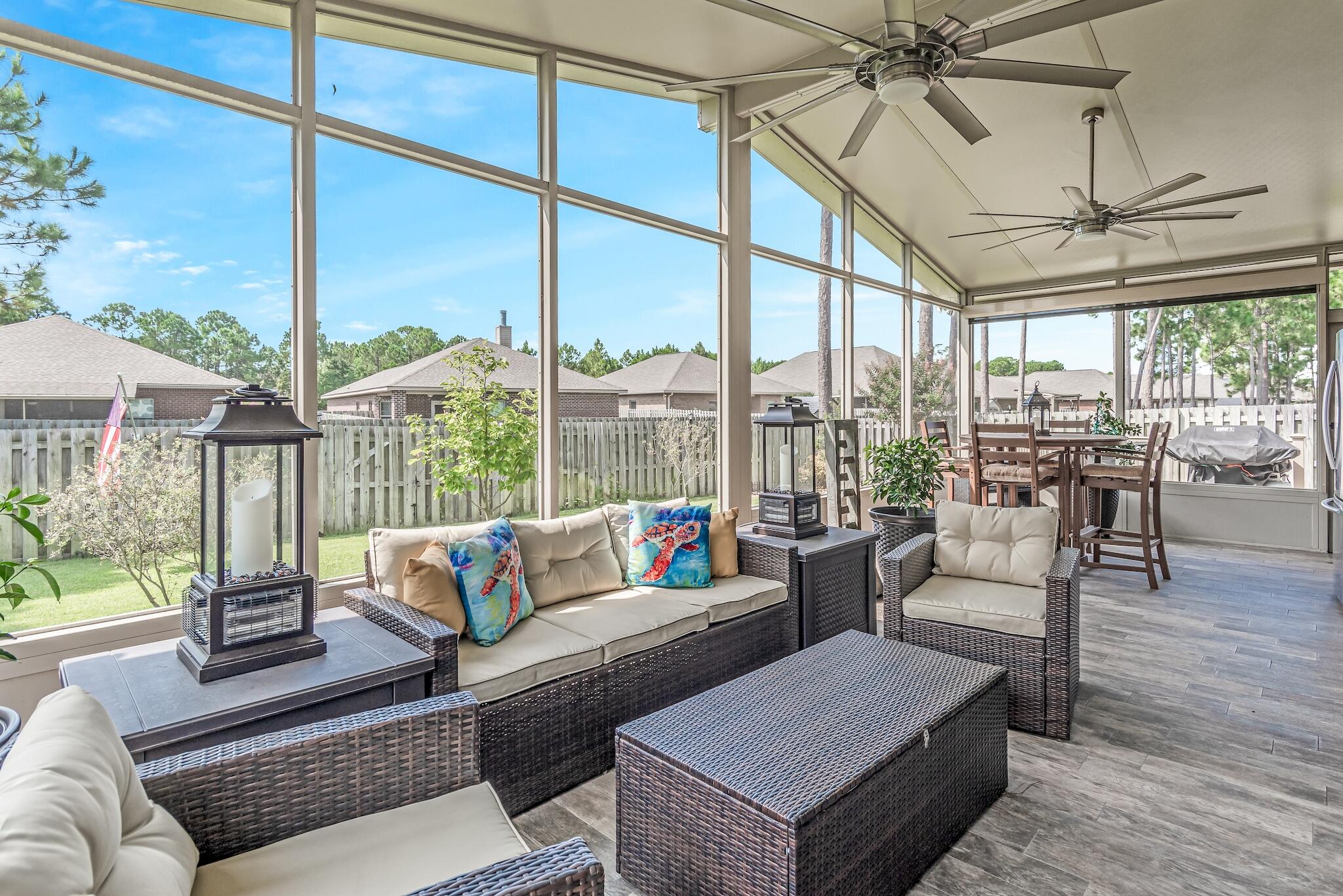 446 Pin Oak Loop Santa Rosa Beach, FL 32459 - Photo 8 of 48 a living room with furniture and a large window