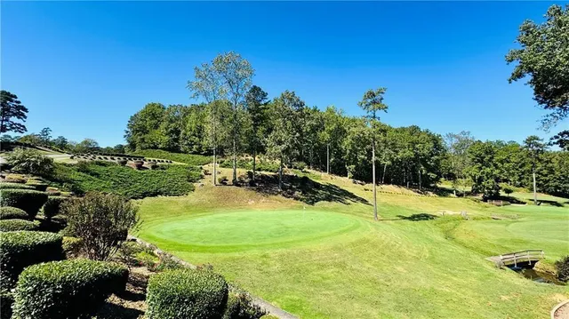 a view of a playground with basketball court