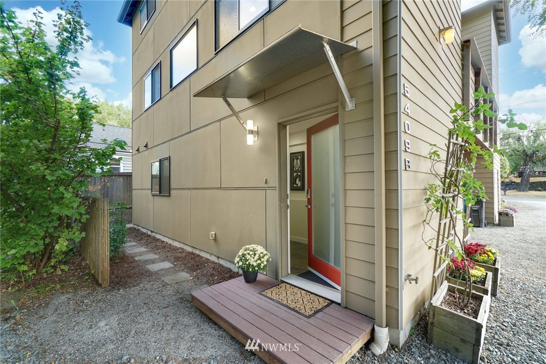 5409 26th Avenue Southwest, Unit B Seattle, WA 98106 - Photo 2 of 31 a view of a chairs in the patio