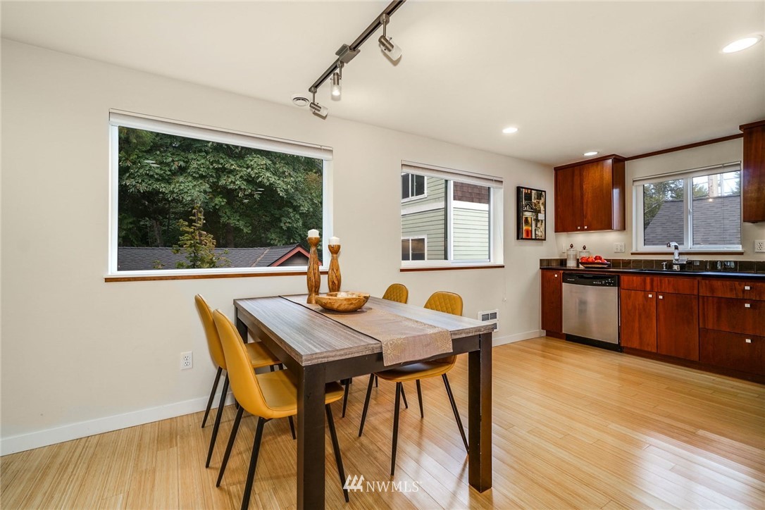 5409 26th Avenue Southwest, Unit B Seattle, WA 98106 - Photo 11 of 31 a view of a dining room with furniture and window