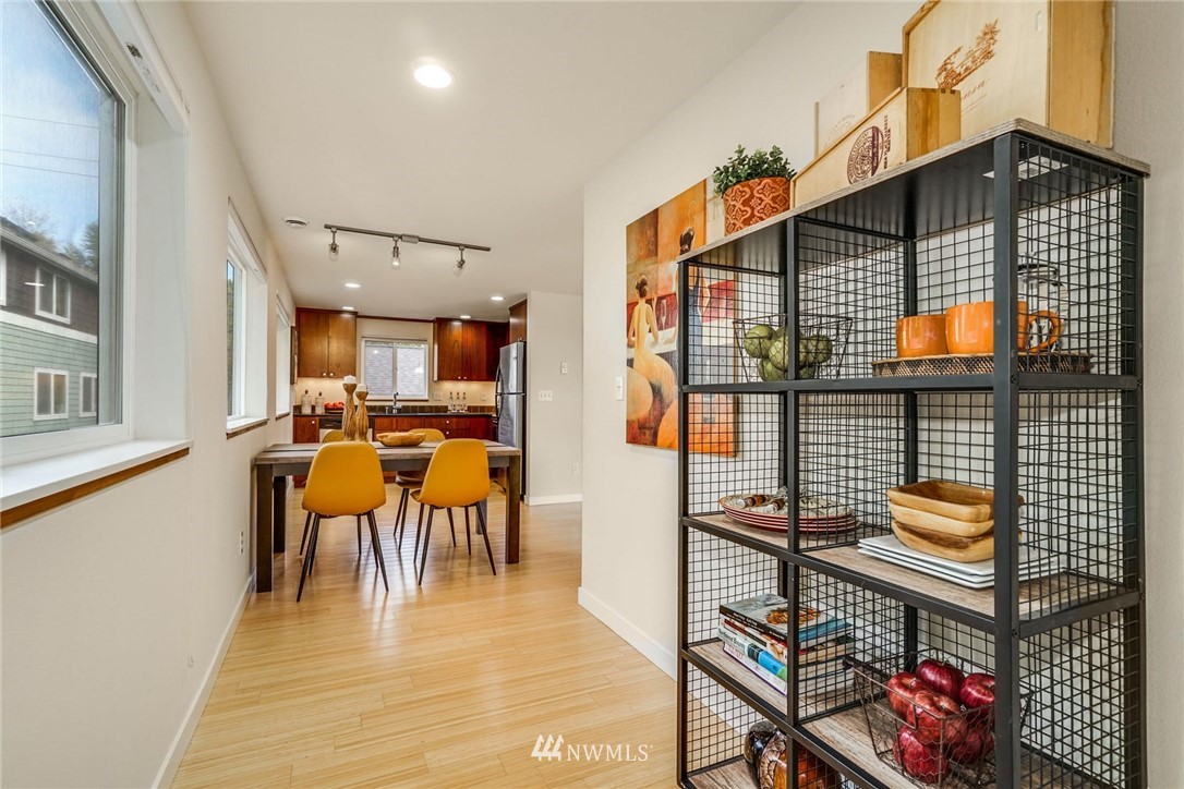 5409 26th Avenue Southwest, Unit B Seattle, WA 98106 - Photo 12 of 31 a view of a dining room with furniture and wooden floor