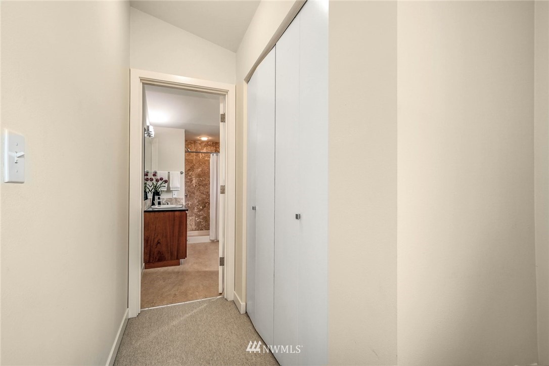 5409 26th Avenue Southwest, Unit B Seattle, WA 98106 - Photo 22 of 31 a view of a bathroom from a hallway