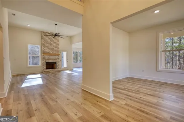 a view of a kitchen with a stove cabinets and wooden floor