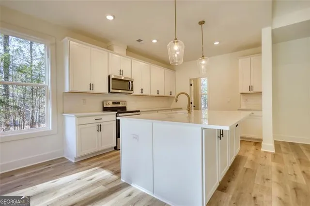 a white bath tub sitting in a bathroom
