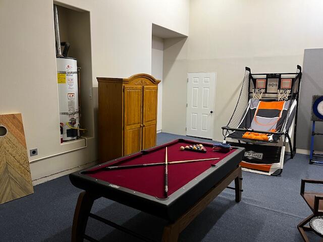 49714 Newman Circle Indio, CA 92201 - Photo 12 of 19 a room with pool table and a wooden floor