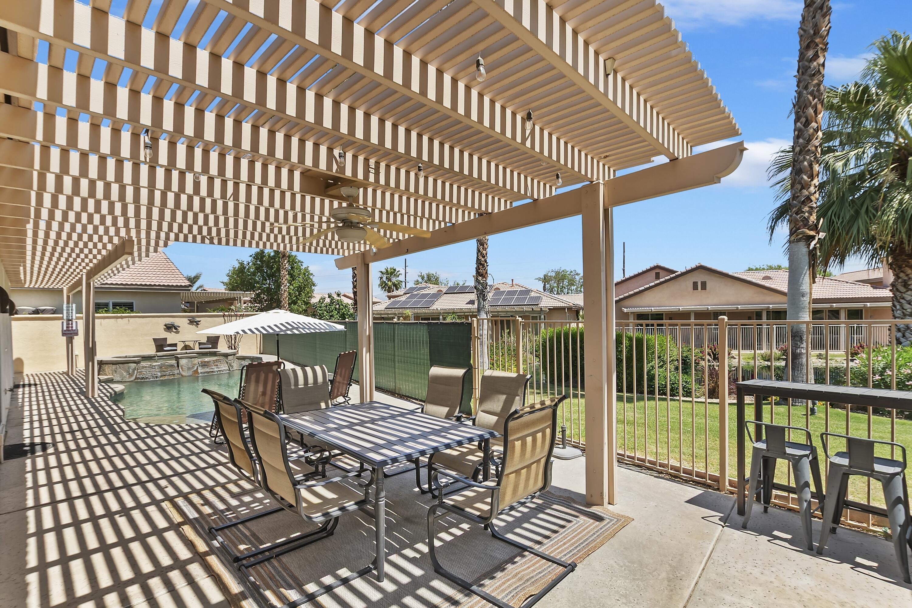 49714 Newman Circle Indio, CA 92201 - Photo 15 of 19 a patio view with a seating space