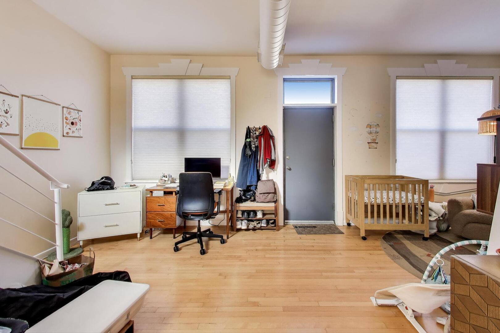 400 North Racine Avenue, Unit 204 Chicago, IL 60642 - Photo 11 of 22 a workspace with furniture and a window