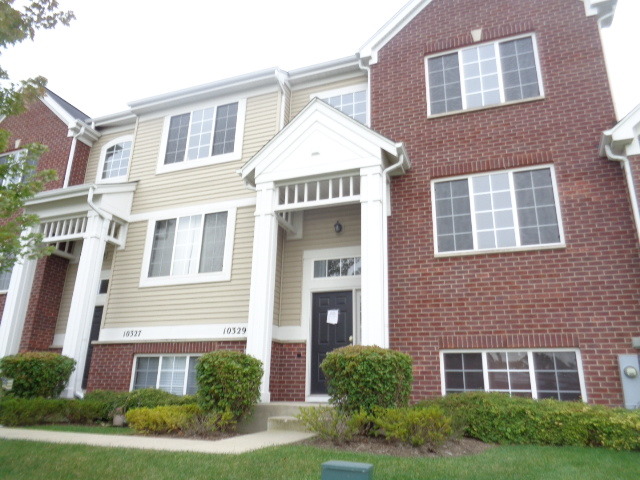 10329 Kerry Ridge Court Chicago Ridge, IL 60415 - Photo 1 of 12 a front view of a house