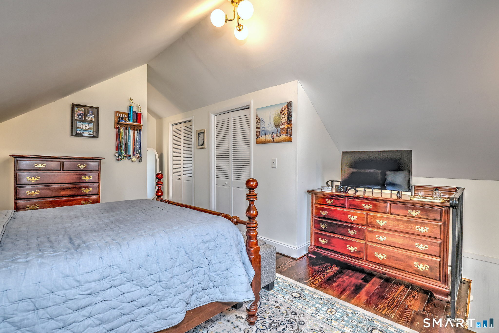 299 Meadows End Road Milford, CT 06460 - Photo 23 of 27 a bedroom with a bed and furniture