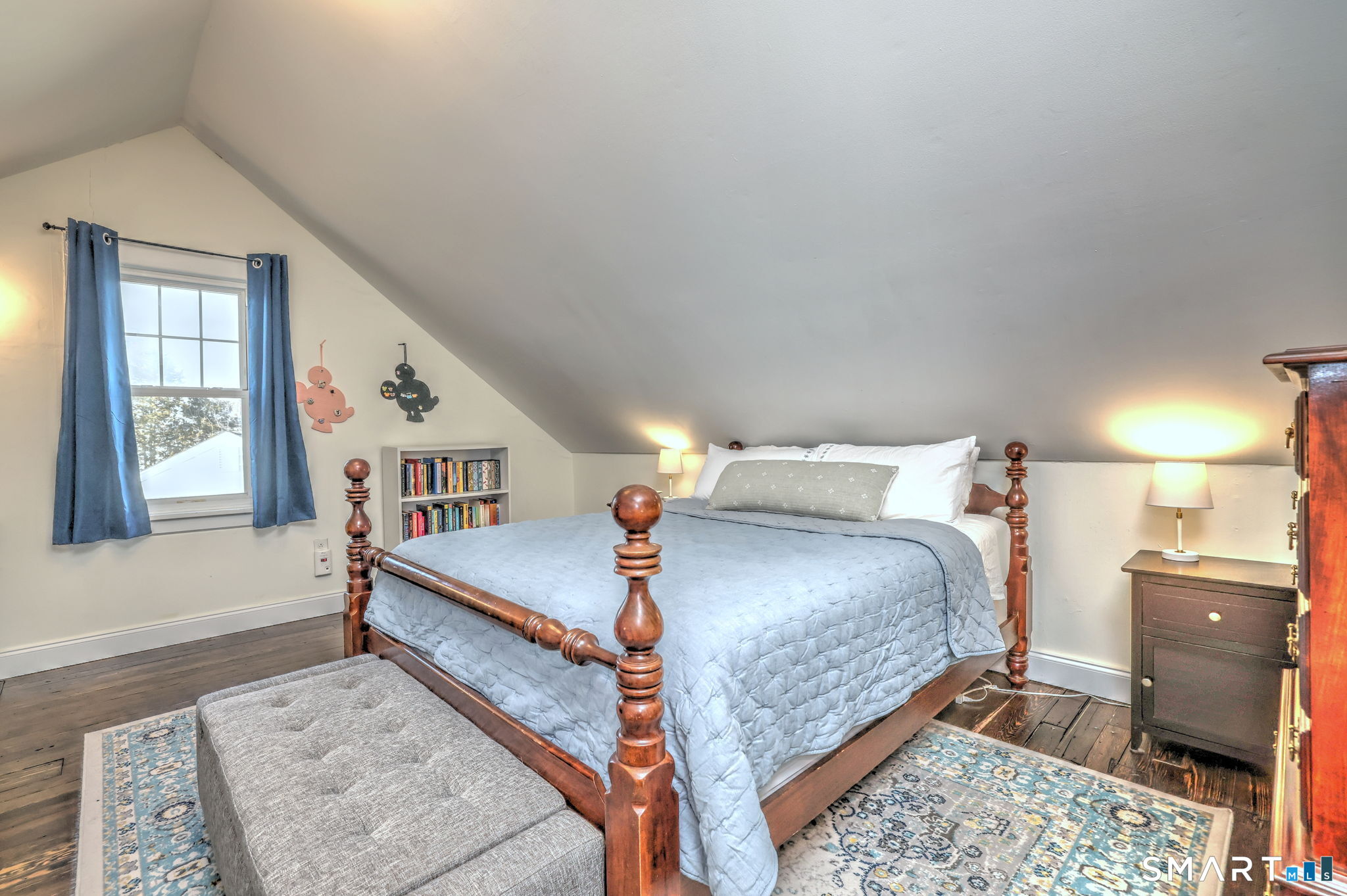 299 Meadows End Road Milford, CT 06460 - Photo 24 of 27 a bed room with a bed and a window