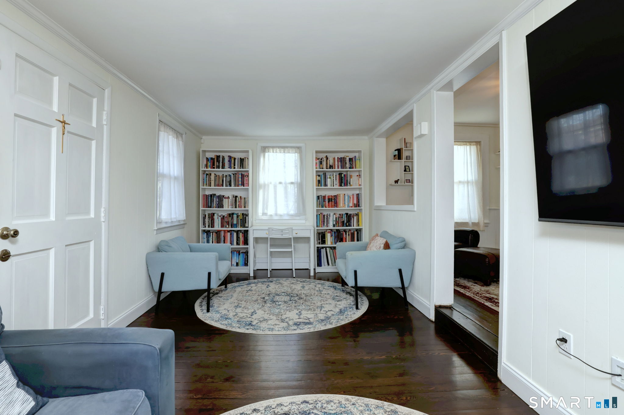 299 Meadows End Road Milford, CT 06460 - Photo 5 of 27 a living room with furniture and a wooden floor