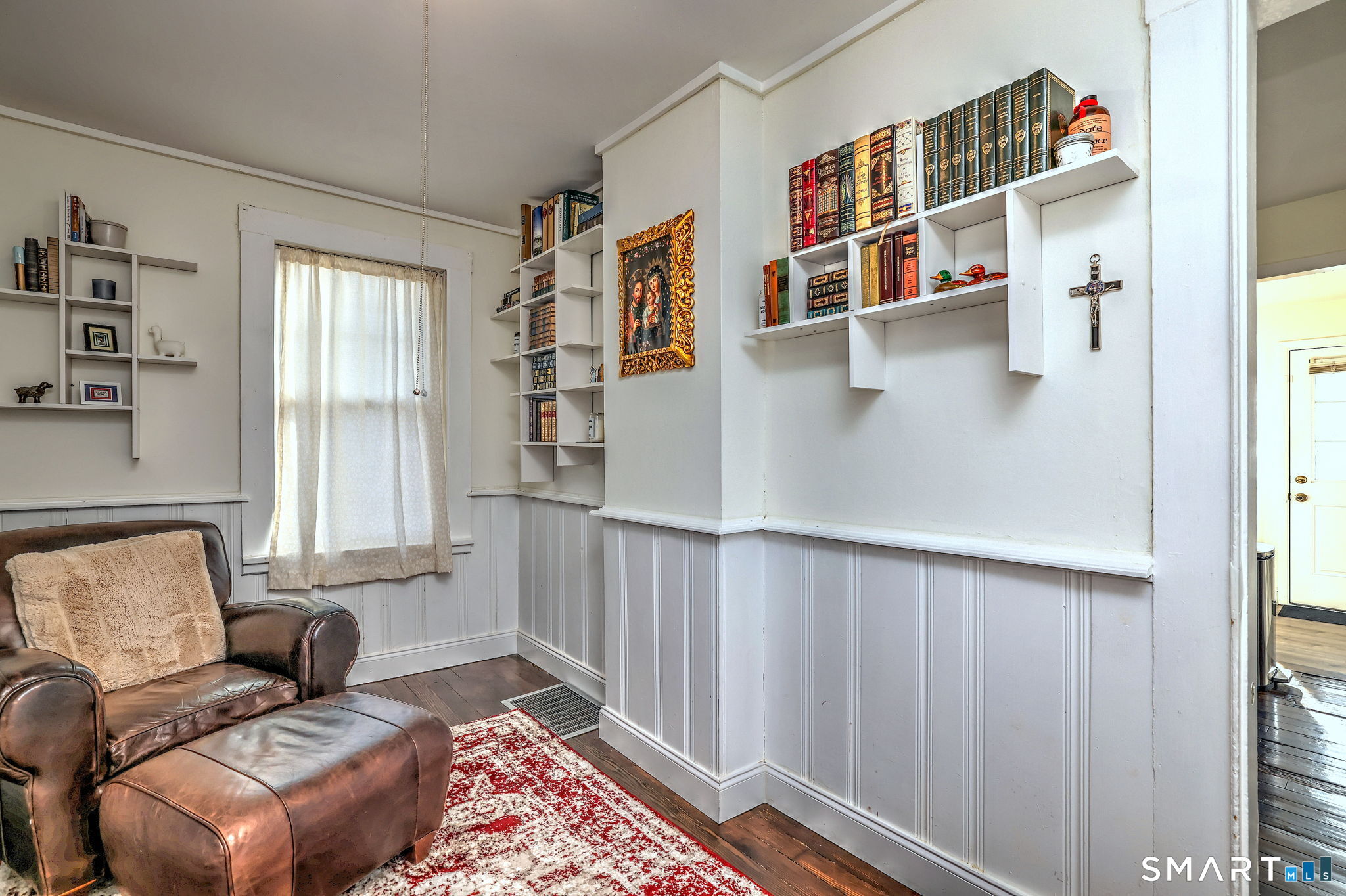 299 Meadows End Road Milford, CT 06460 - Photo 7 of 27 a living room with furniture and a window