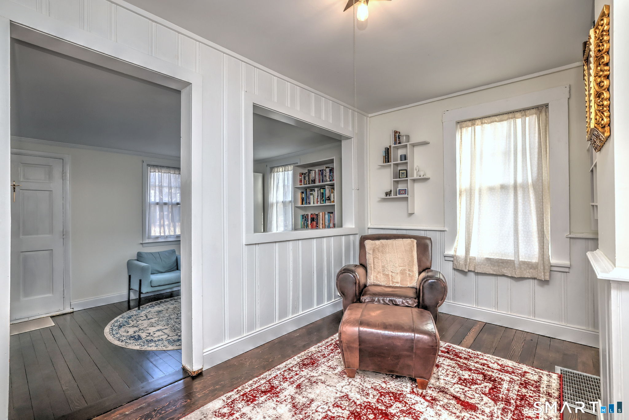 299 Meadows End Road Milford, CT 06460 - Photo 8 of 27 a living room with furniture and a window