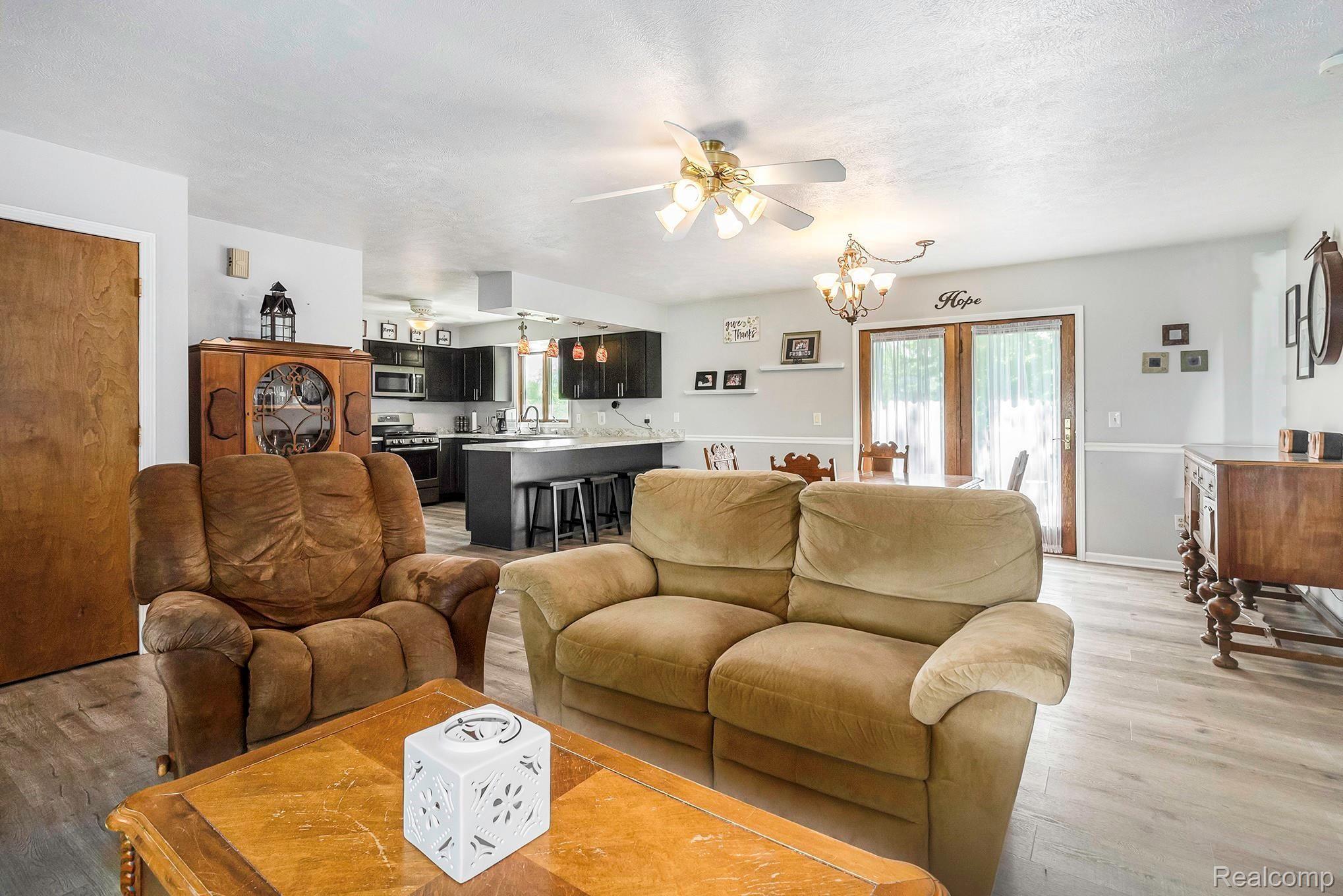 3307 North Cedar Road Fowlerville, MI 48836 - Photo 10 of 33 3307 Living rm dining and kitchen.jpg