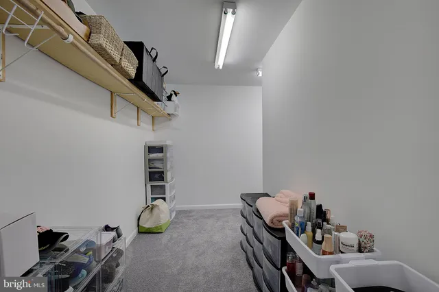 a view of a workspace with furniture