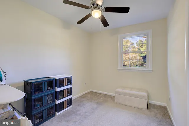 a kitchen with stainless steel appliances kitchen island granite countertop a table and chairs in it