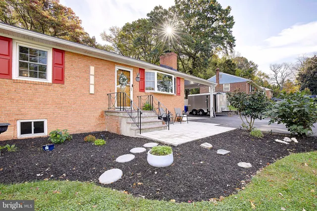 a front view of a house with yard