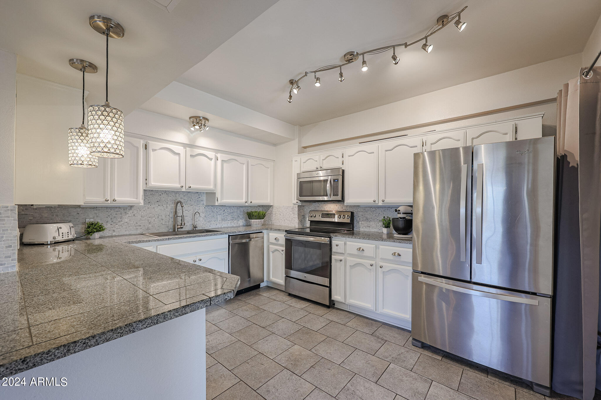 353 East Thomas Road, Unit C408 Phoenix, AZ 85012 - Photo 6 of 35 White cabinets