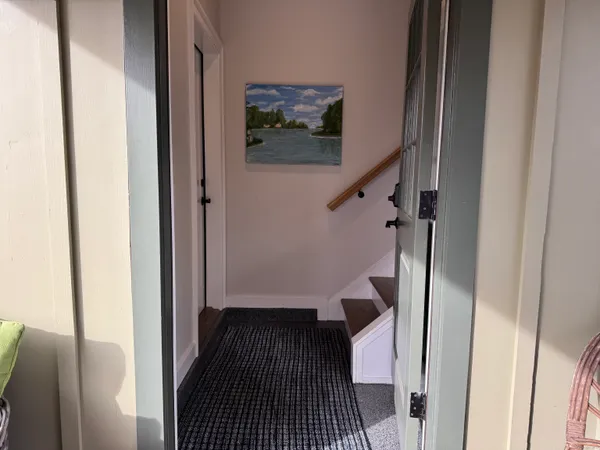 a view of hallway with stairs