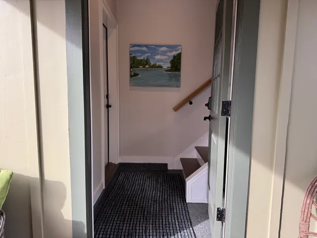 a view of hallway with stairs