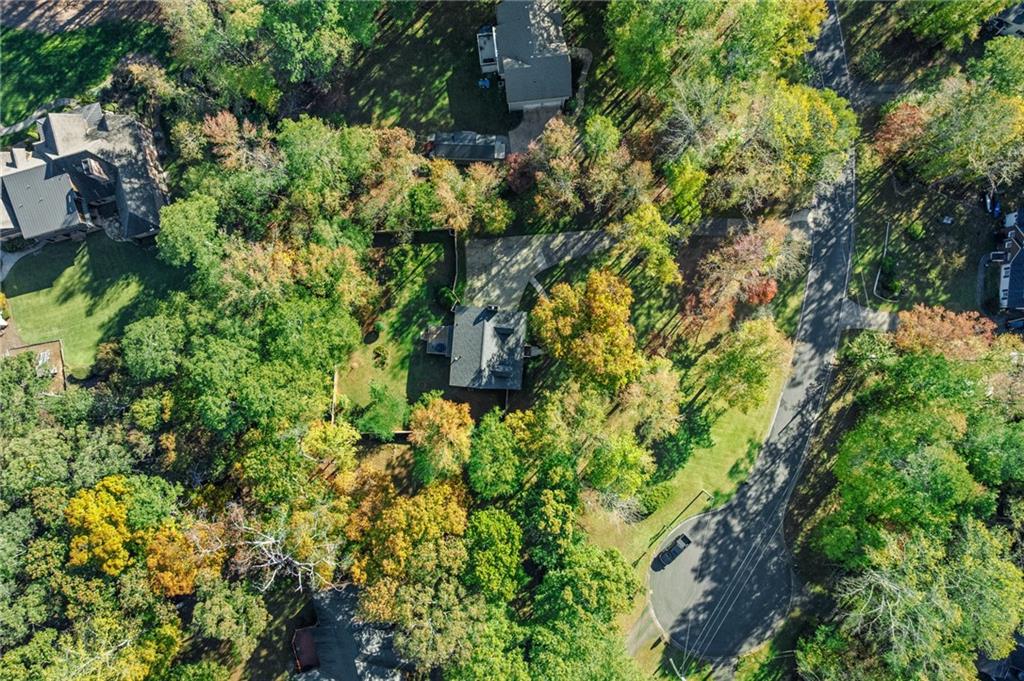 4230 Jonathan Lane Cumming, GA 30040 - Photo 52 of 57 an aerial view of a house with a yard