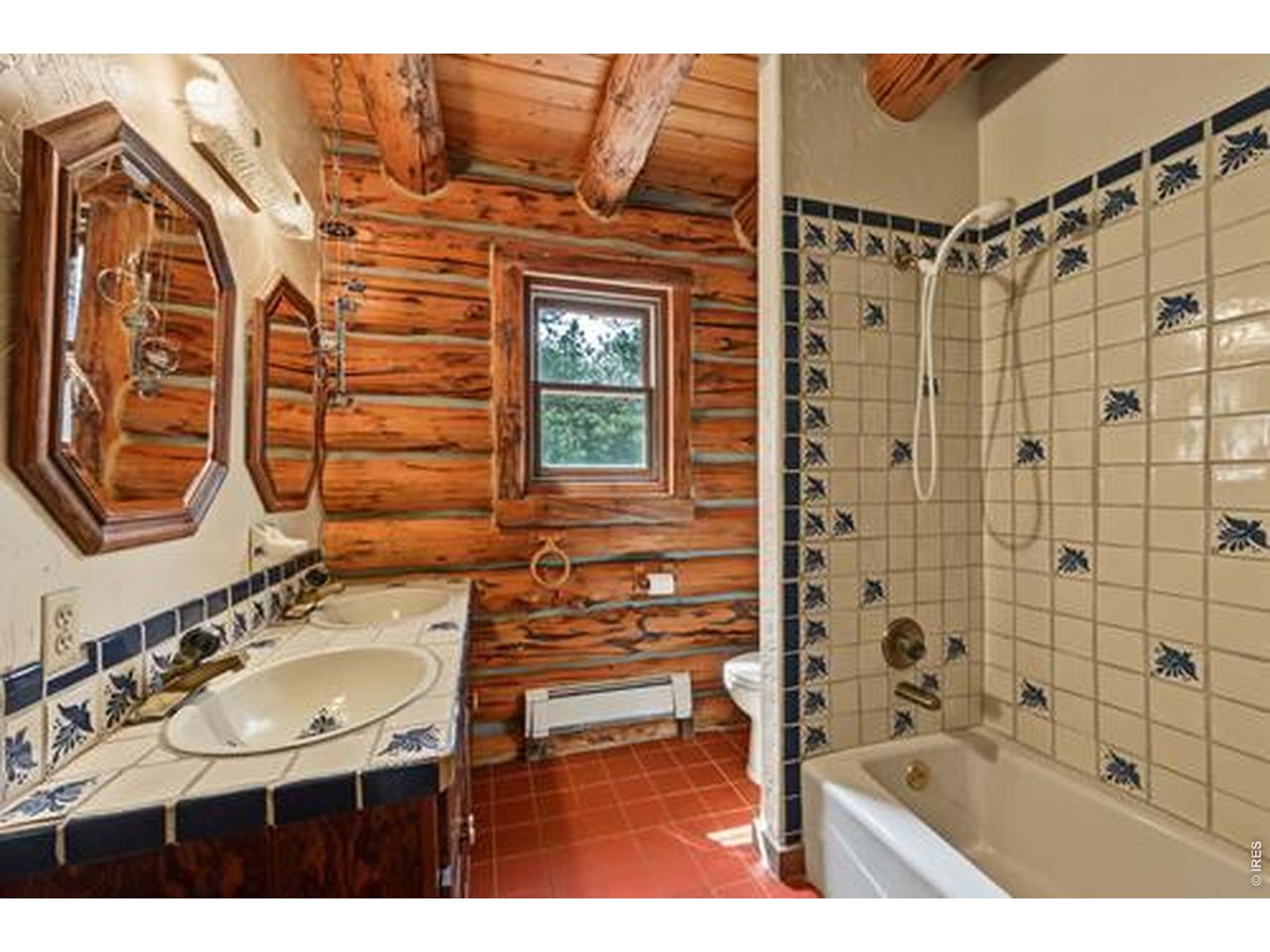 788 Pioneer Road Lyons, CO 80540 - Photo 23 of 50 Main bath with Mexican tile