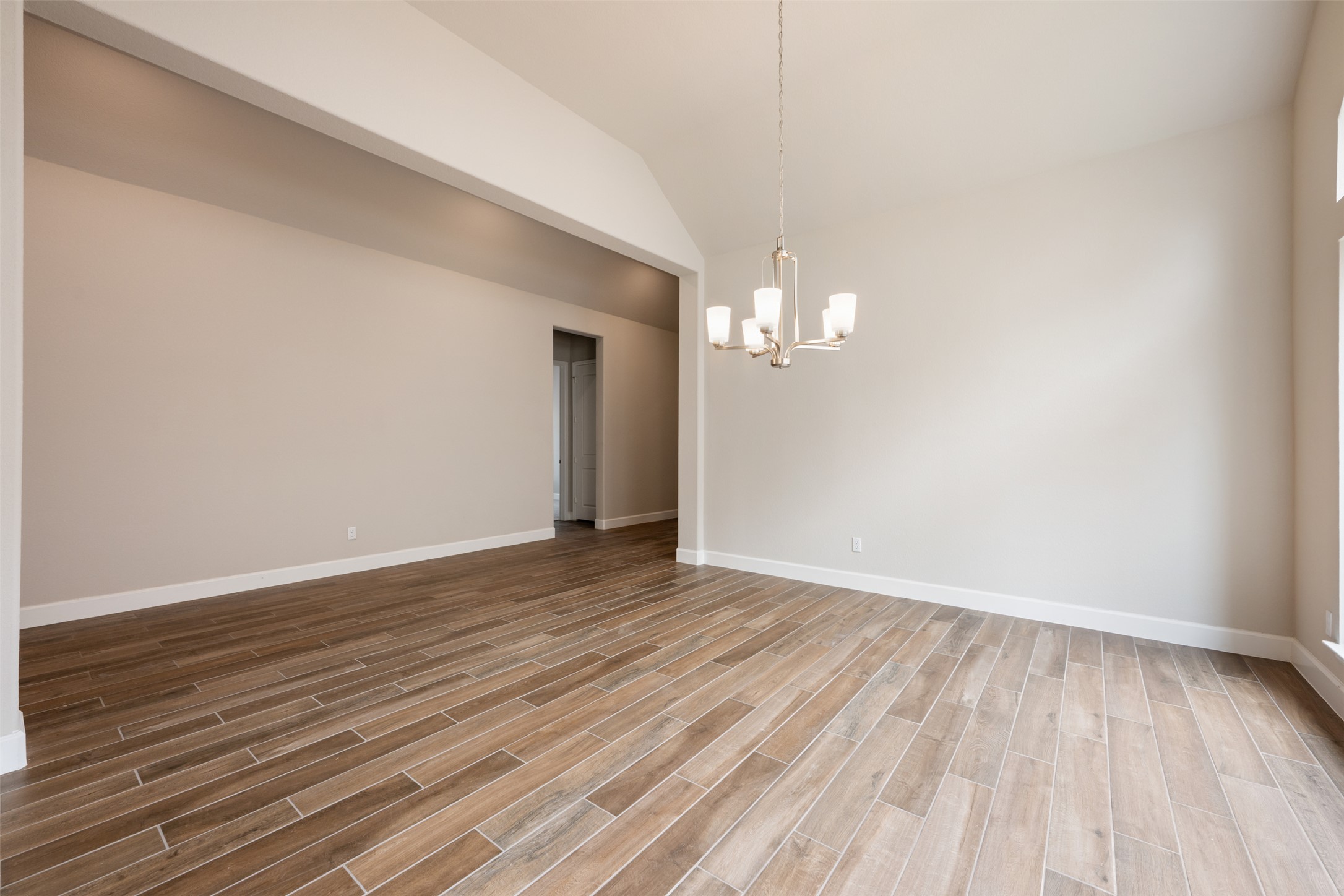 104 Anejo Bluff Georgetown, TX 78628 - Photo 18 of 40 a view of empty room with wooden floor and fan