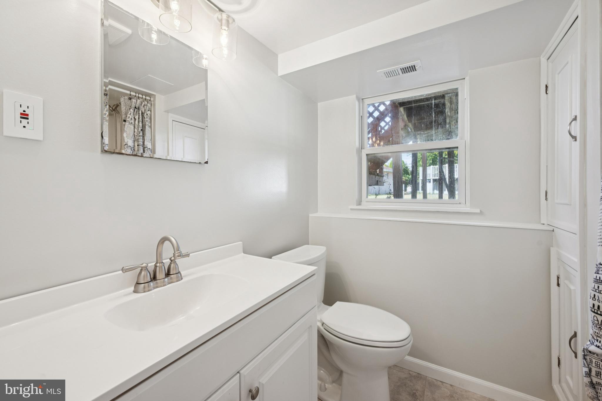 43 Princeton Drive Delran, NJ 08075 - Photo 20 of 25 a white toilet sitting next to a bathroom sink