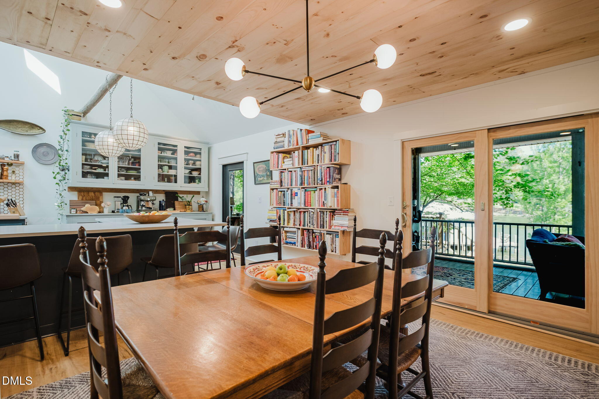 370 Robinson Ferry Road Macon, NC 27551 - Photo 24 of 85 a view of a dining room with furniture window and wooden floor