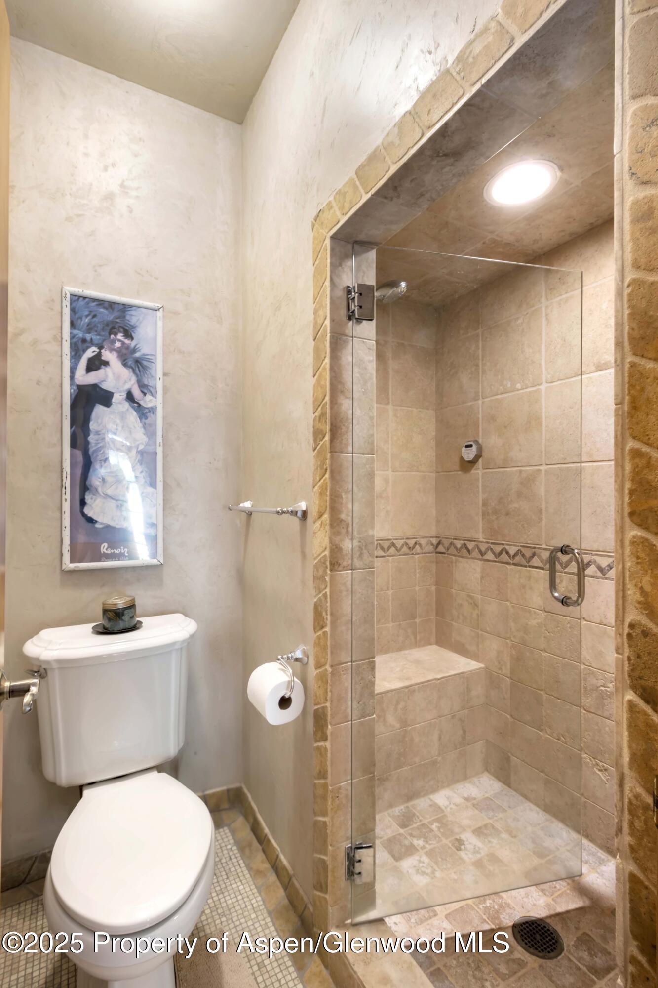 2687 Fairview Heights Court Rifle, CO 81650 - Photo 18 of 40 a white toilet sitting next to a bathroom sink