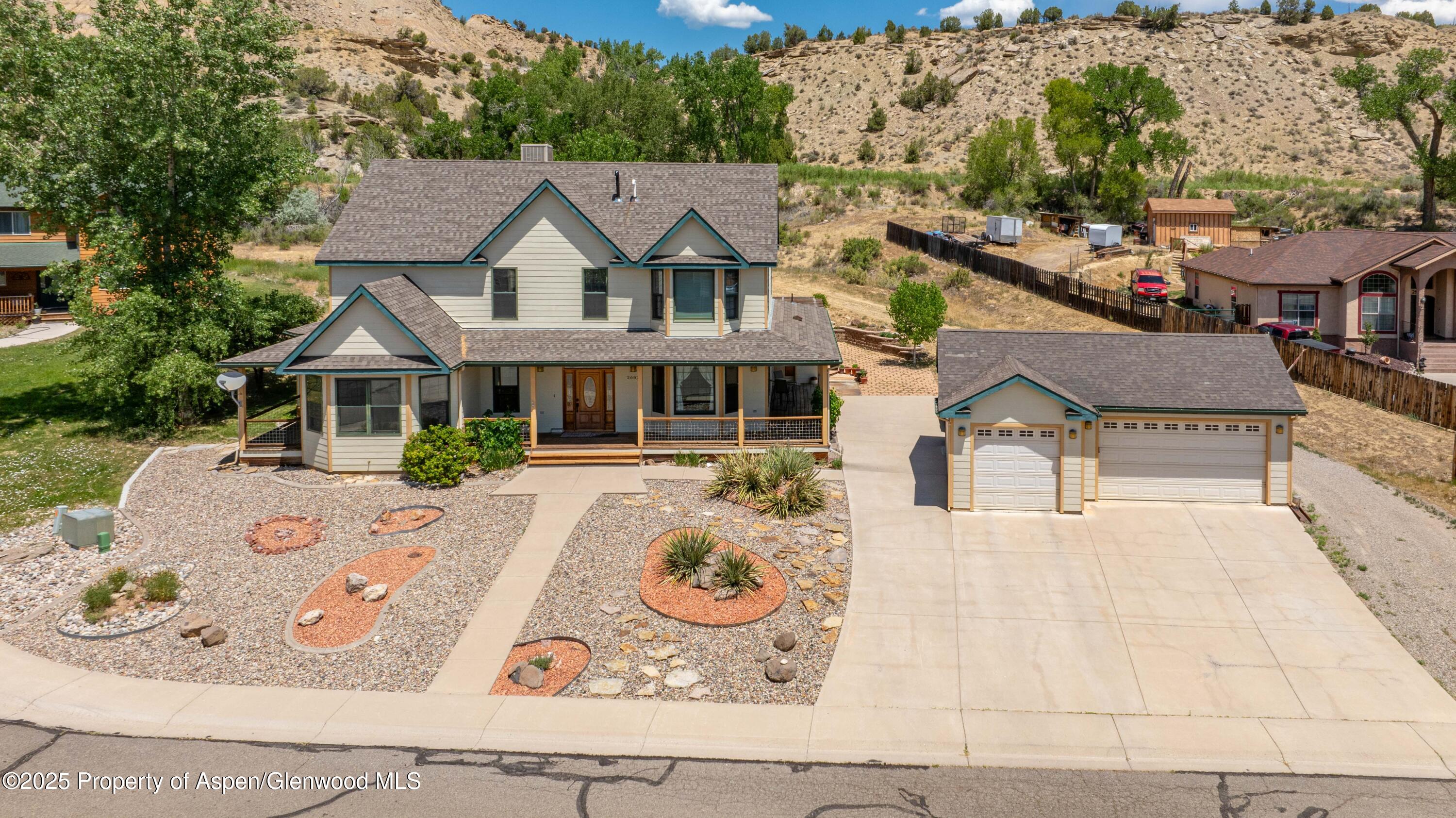 2687 Fairview Heights Court Rifle, CO 81650 - Photo 2 of 40 an aerial view of a house with swimming pool and furniture