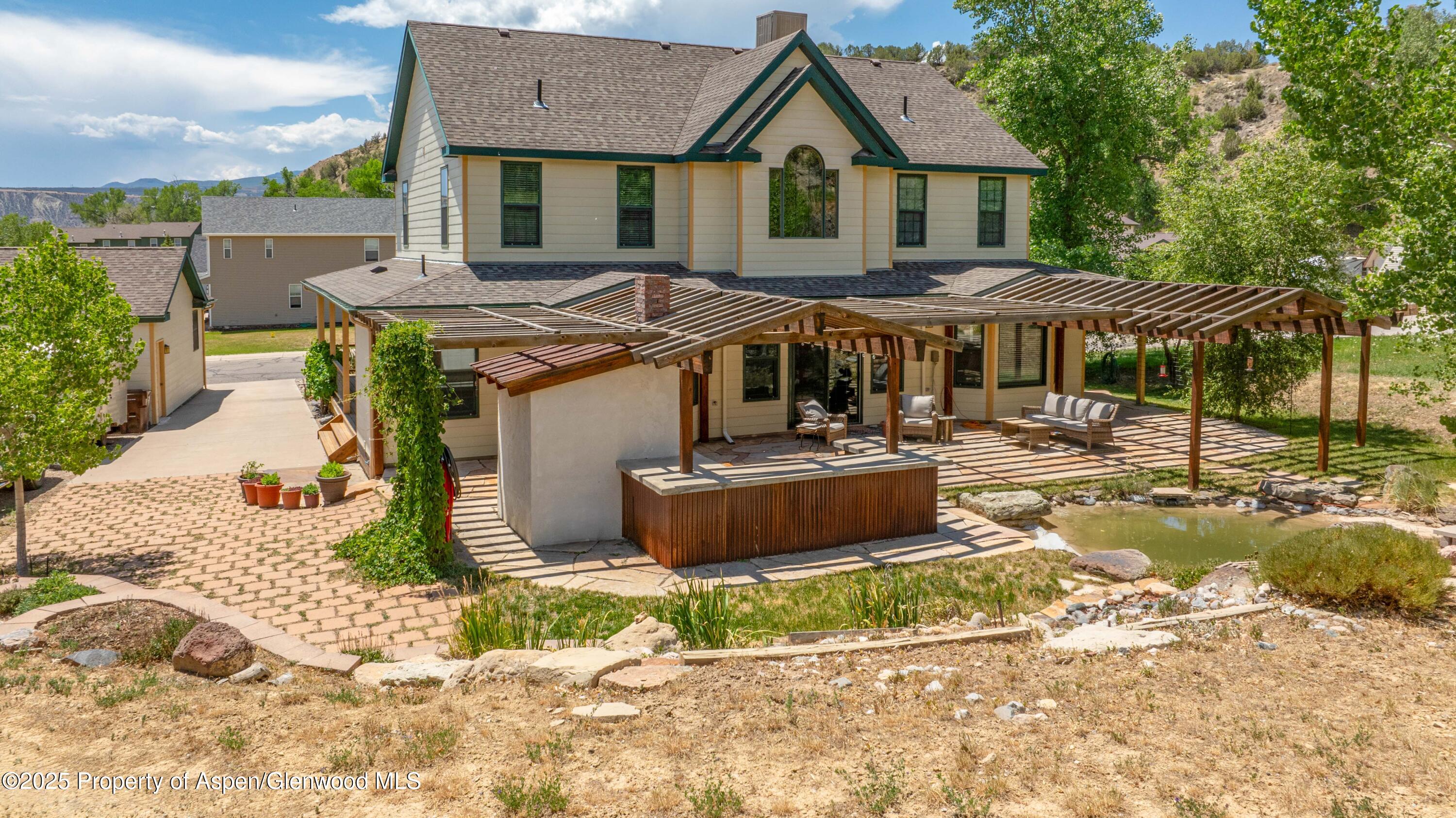 2687 Fairview Heights Court Rifle, CO 81650 - Photo 31 of 40 a front view of a house with garden