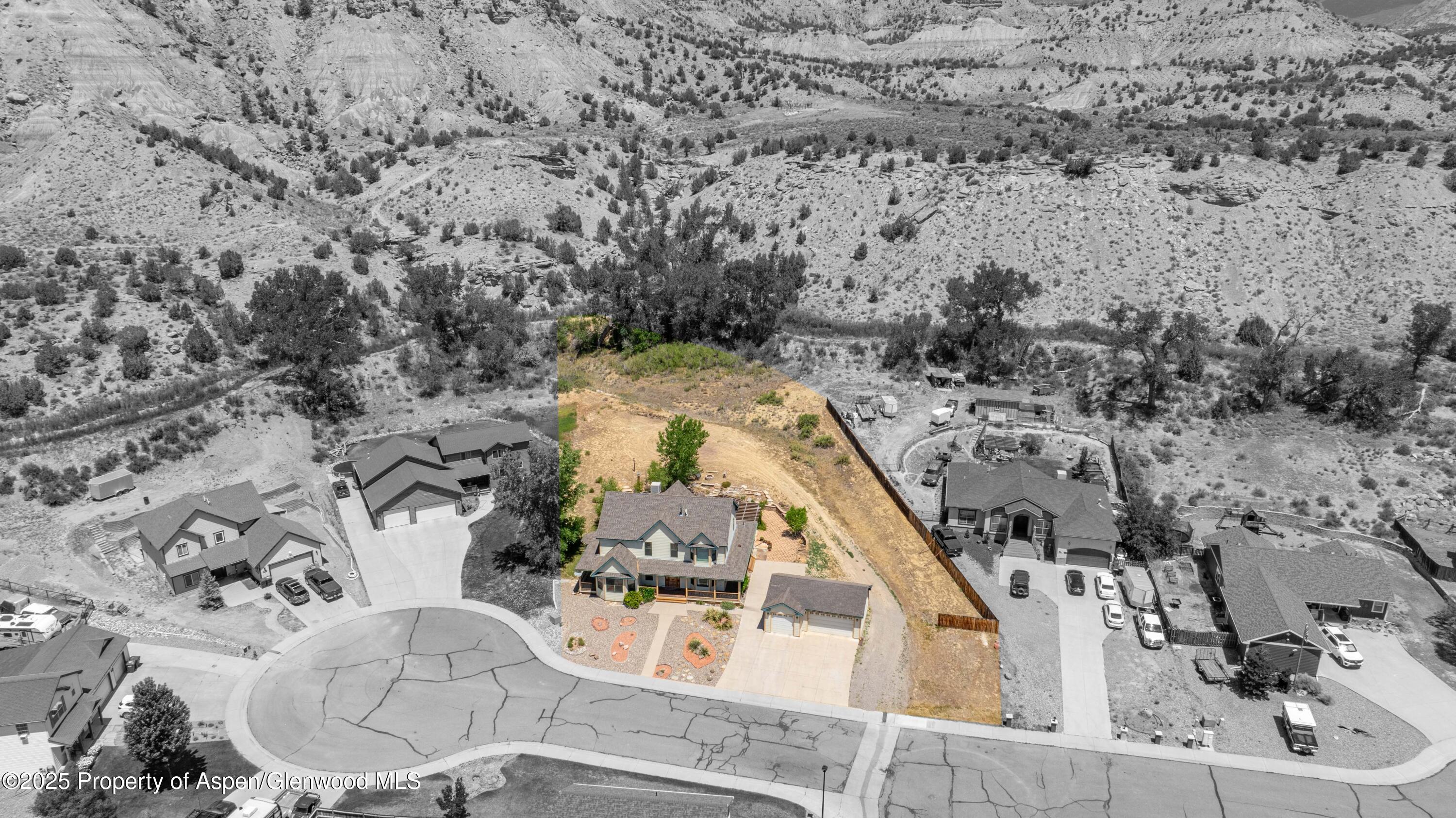 2687 Fairview Heights Court Rifle, CO 81650 - Photo 37 of 40 an aerial view of a house with a swimming pool