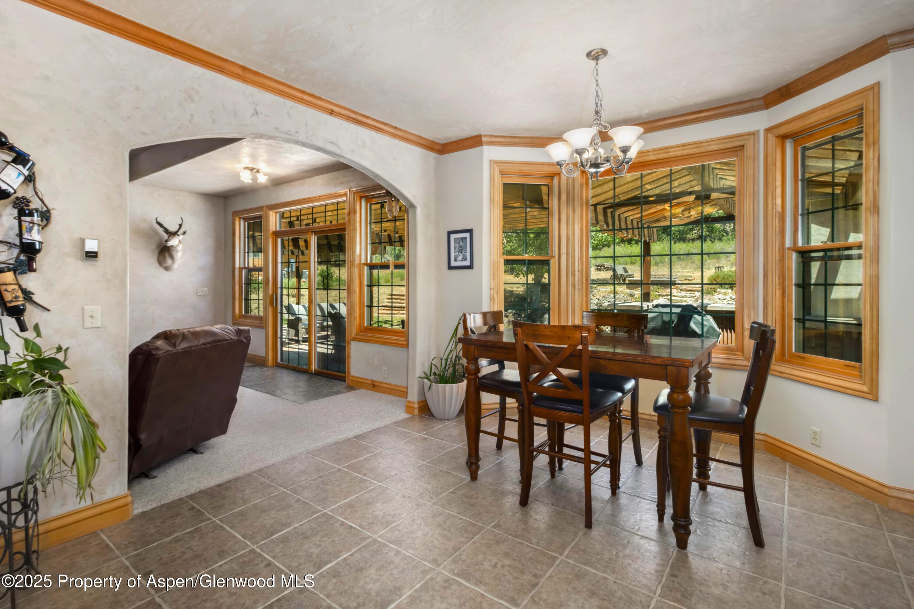 2687 Fairview Heights Court Rifle, CO 81650 - Photo 8 of 40 a view of a dining room with furniture window and outside view