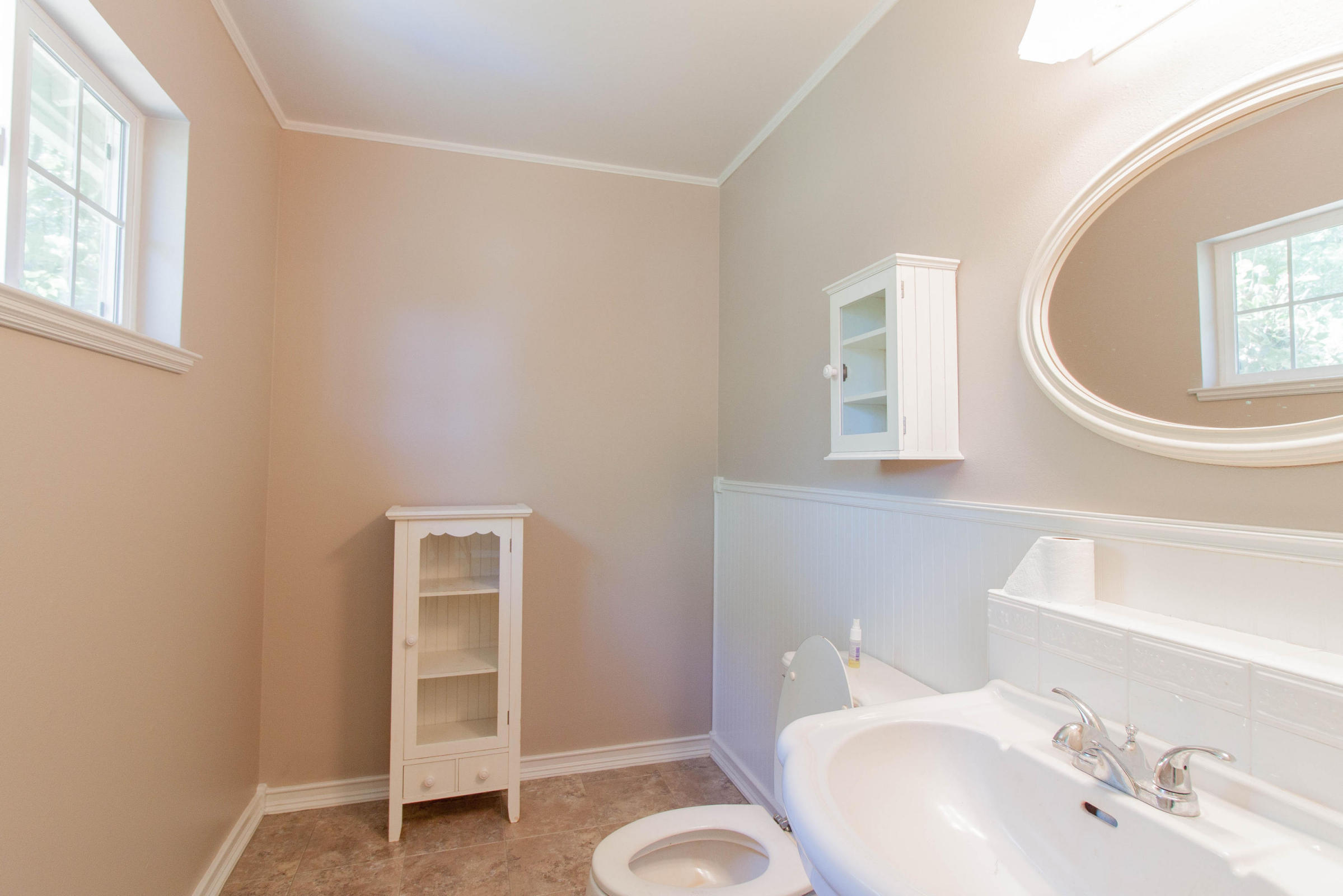 4801 Balls Ferry Road Anderson, CA 96007 - Photo 7 of 22 a bathroom with a sink and a mirror