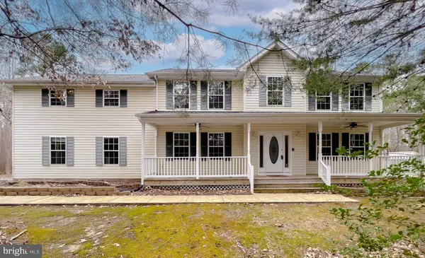 a view of a house with a swimming pool