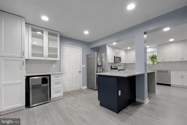 a bedroom with a bed and a television