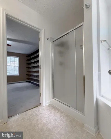 a view of cabinets and window