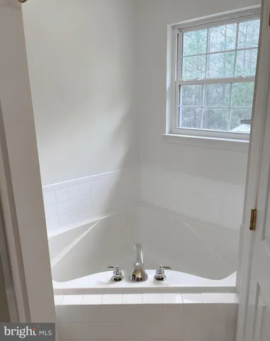 a view of an empty room with window