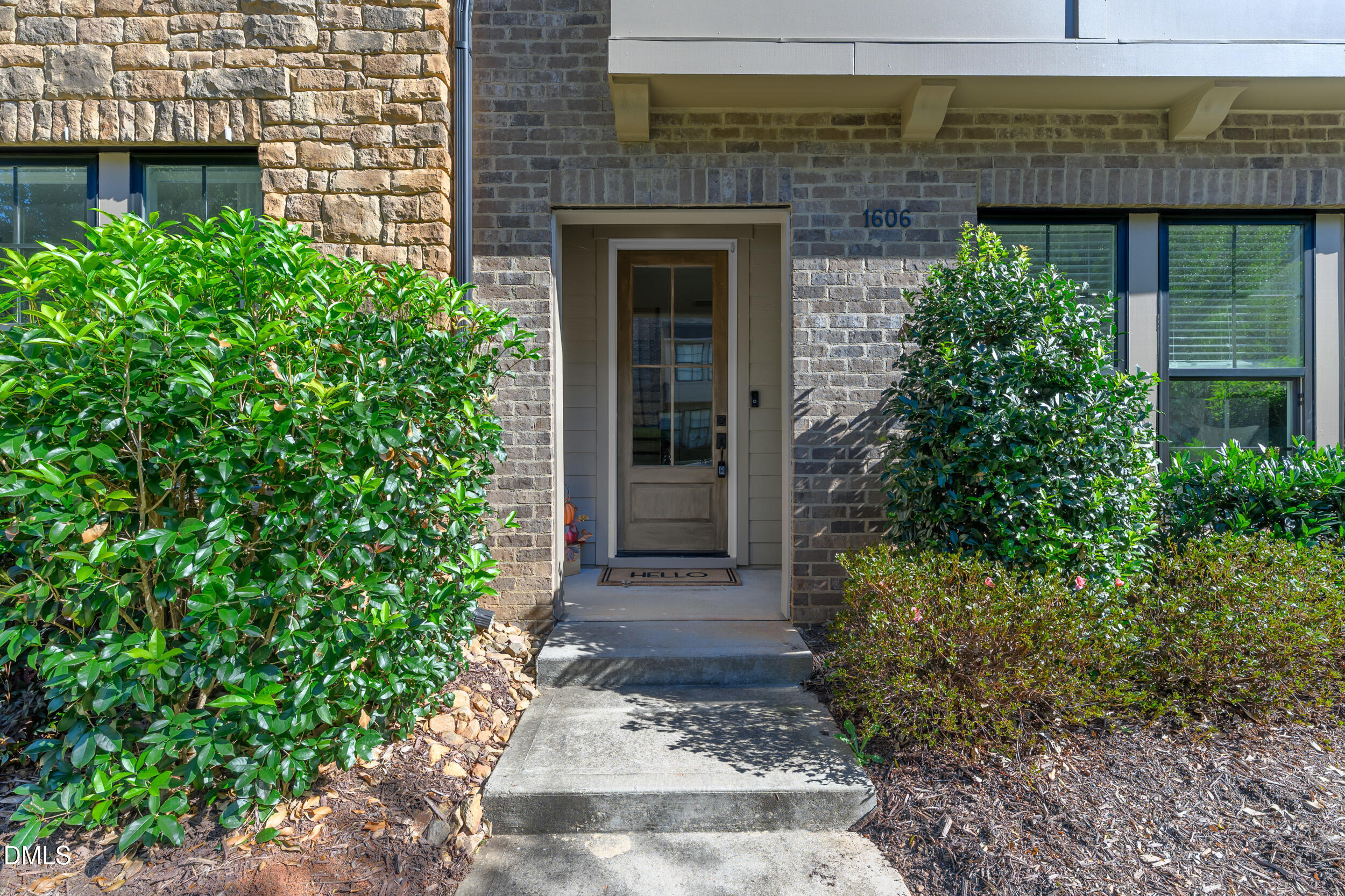 1606 Wooster Street Raleigh, NC 27607 - Photo 2 of 26 a front view of a house with garden