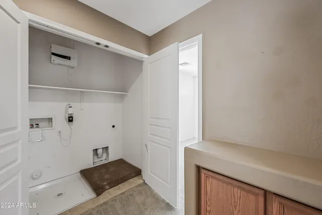 a view of kitchen and utility room